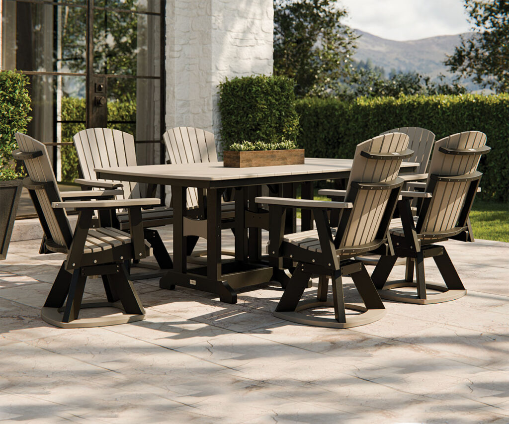 Outdoor poly dining furniture set with swivel chairs on stone patio