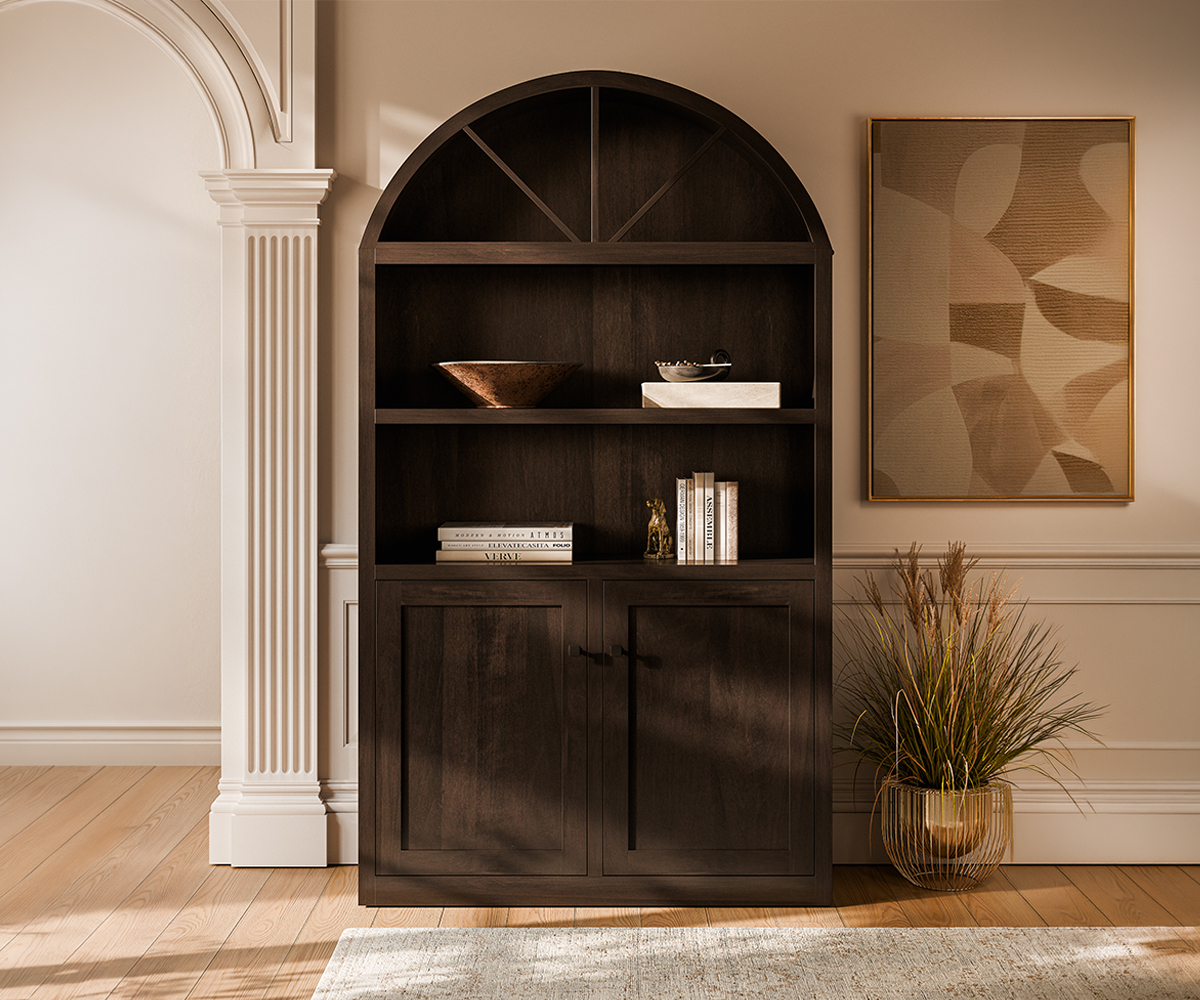 Dark solid wood bookcase cabinet with arched top and lower storage doors