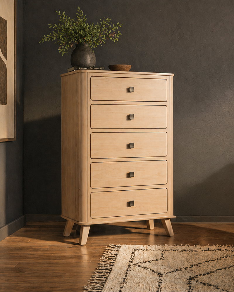 Solid wood bedroom chest furniture with five drawers in a warm room.